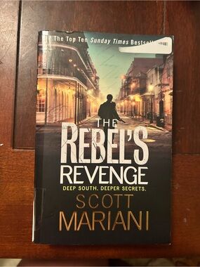 The Rebel's Revenge by Scott Mariani - Black & Gold Paperback